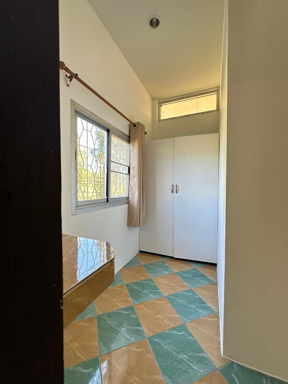 Storage and dressing area in bungalow
